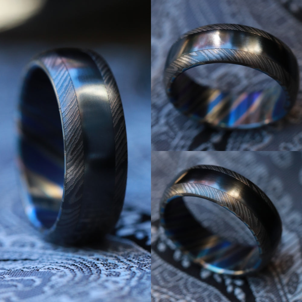 Black titanium and zirconium niobium damscus domed