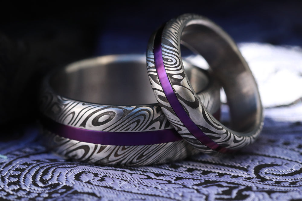 Purple titanium and damasteel damascus rings his and her ring set 2 rings customizable rings