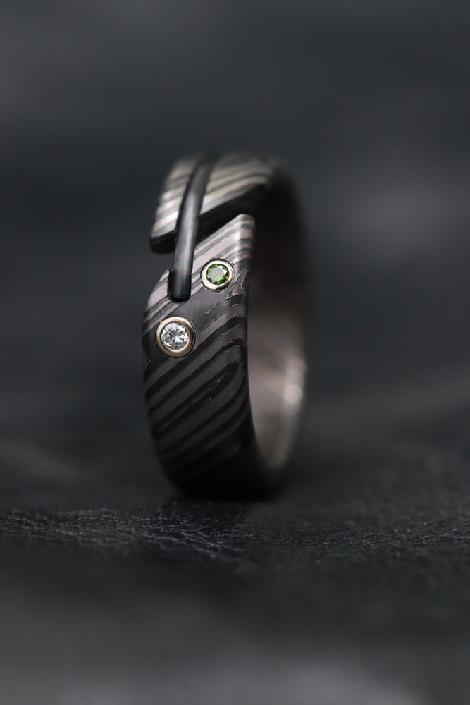 Green and white diamond niobium zirconium damsacus ring